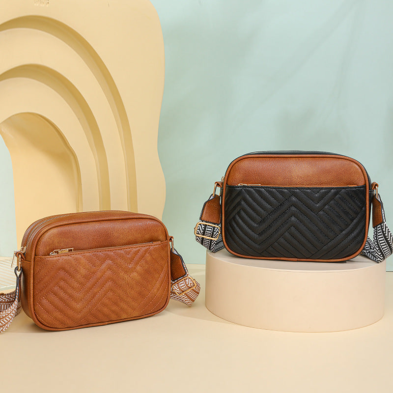 Quilted crossbody bag with front pocket