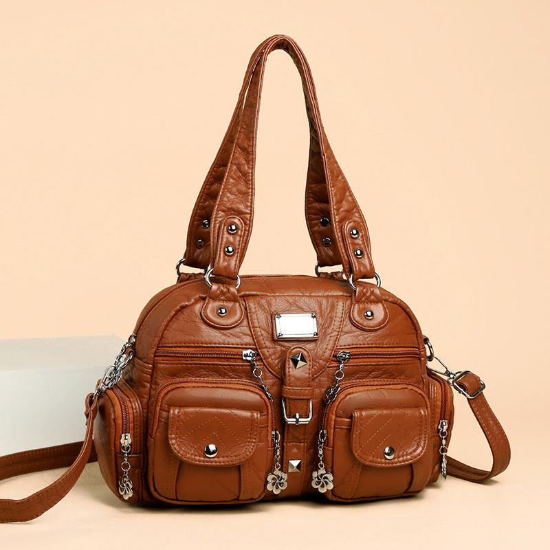 Multi-pocket handbag with detachable strap
