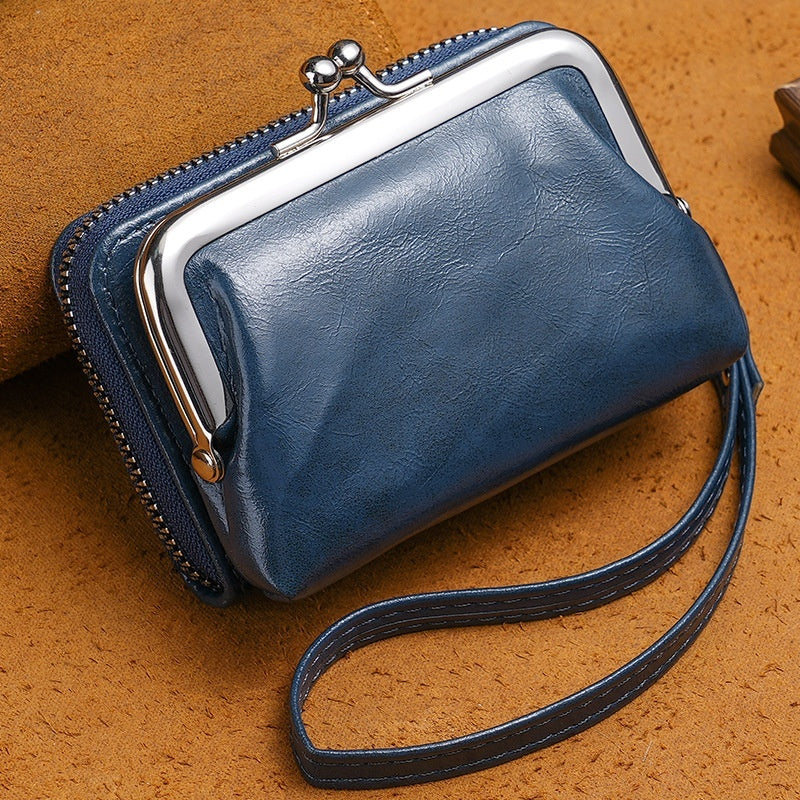 Compact wallet with dual closure design