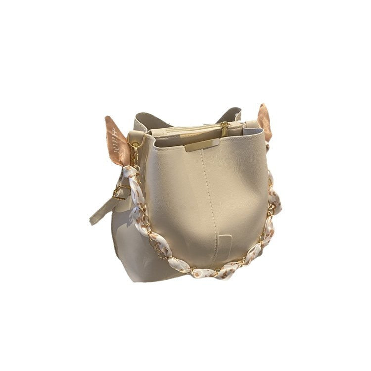 Bucket bag with fabric handle detail