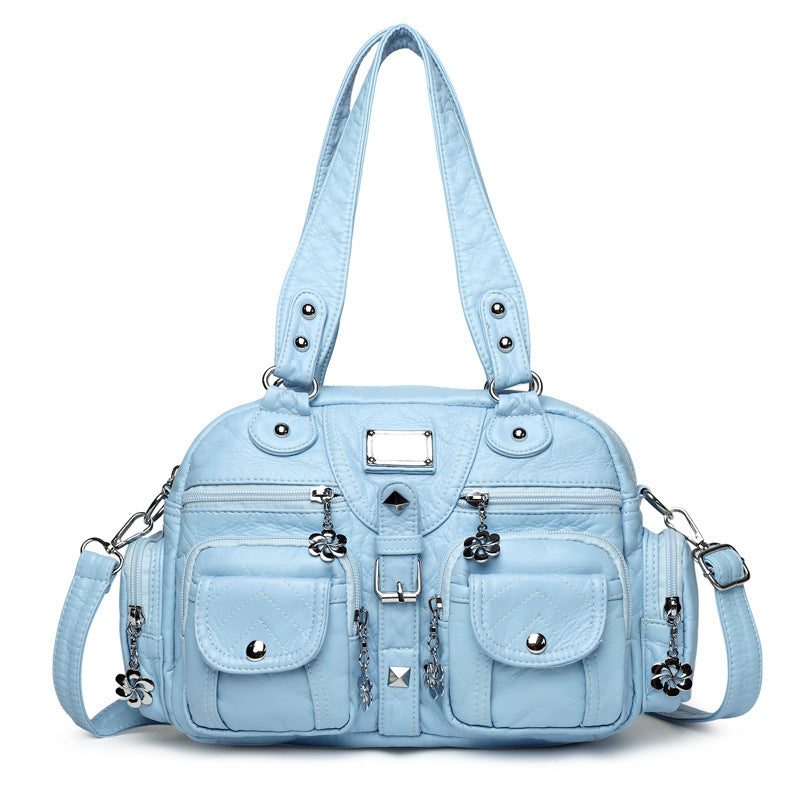 Multi-pocket handbag with detachable strap