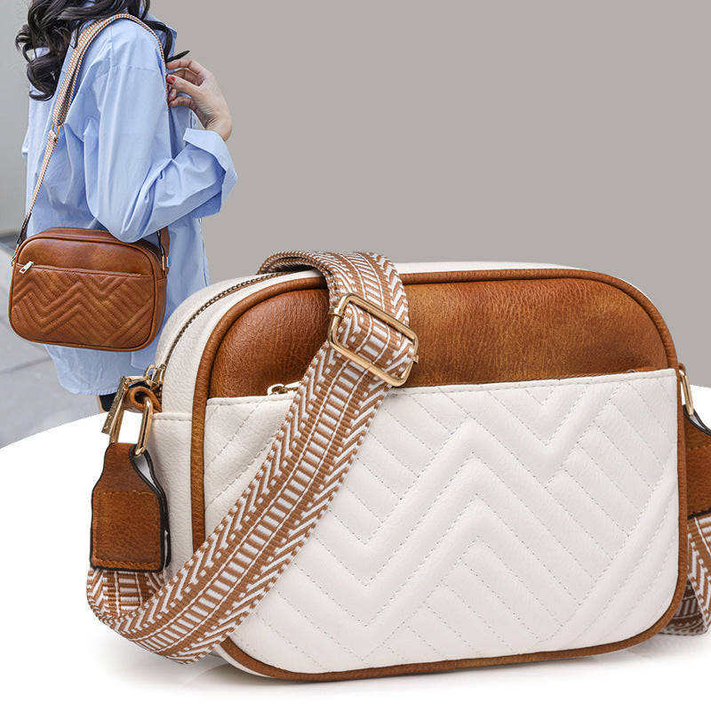 Quilted crossbody bag with front pocket