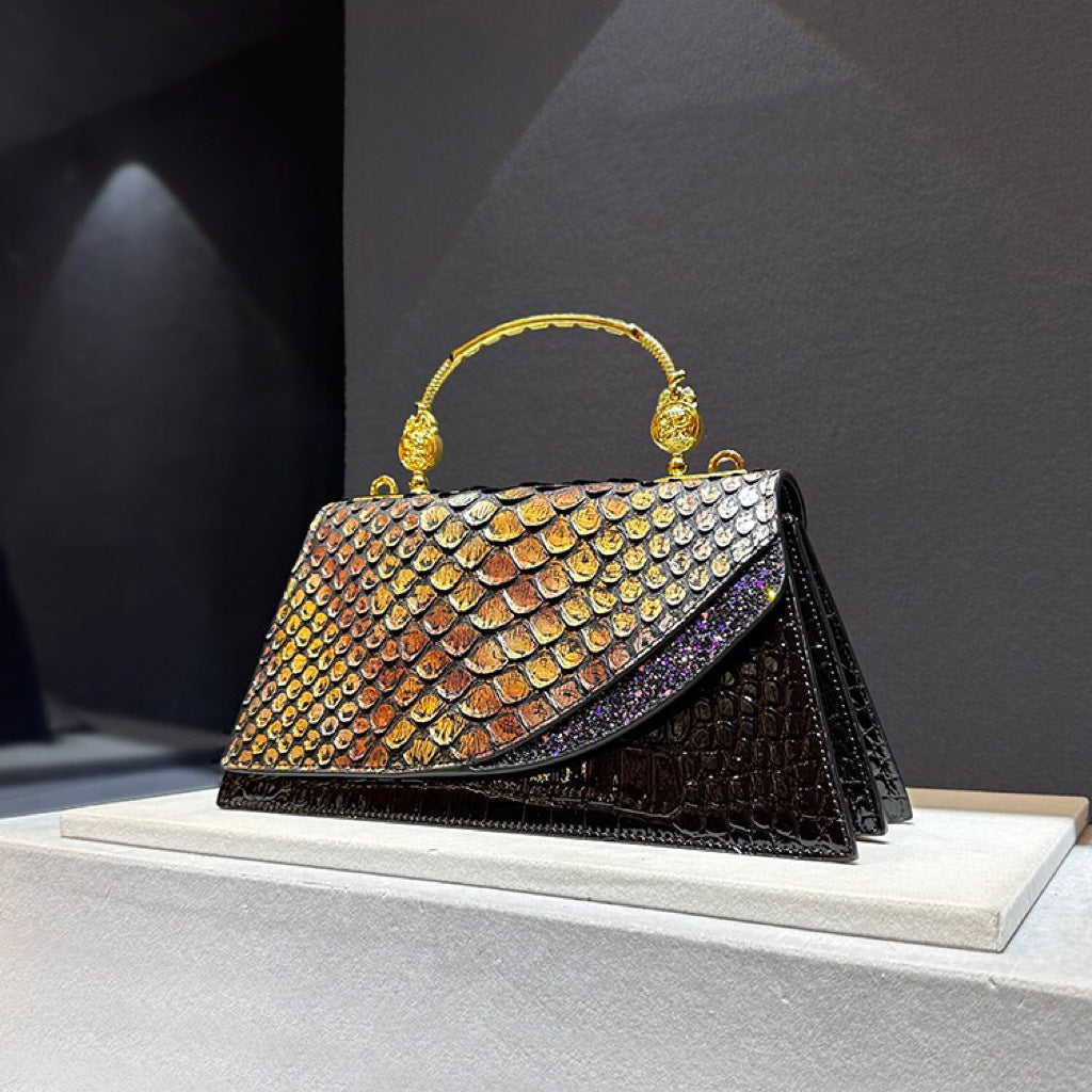 Structured handbag with metallic handle