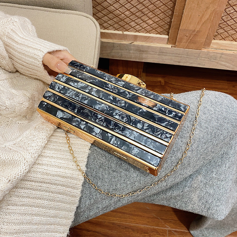 Rhinestone embellished clutch bag with chain strap