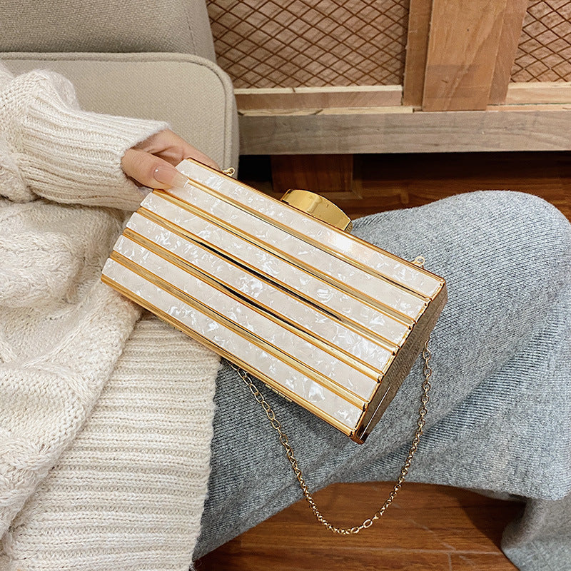 Rhinestone embellished clutch bag with chain strap