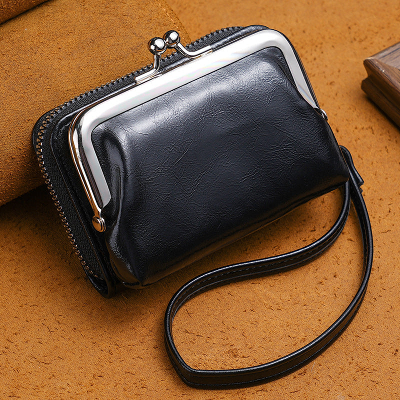 Compact wallet with dual closure design