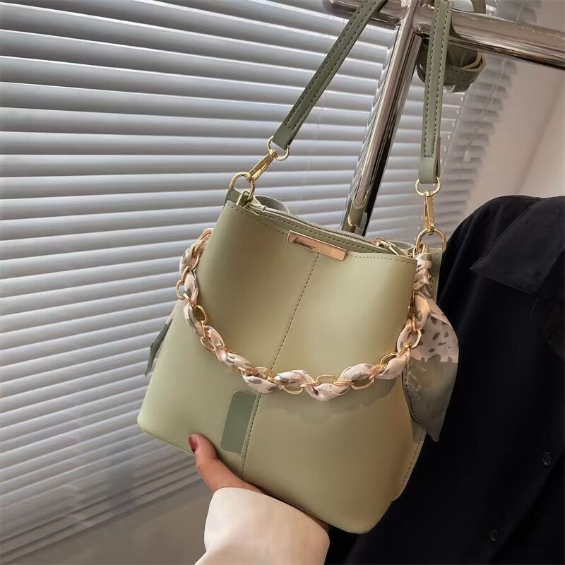 Bucket bag with fabric handle detail