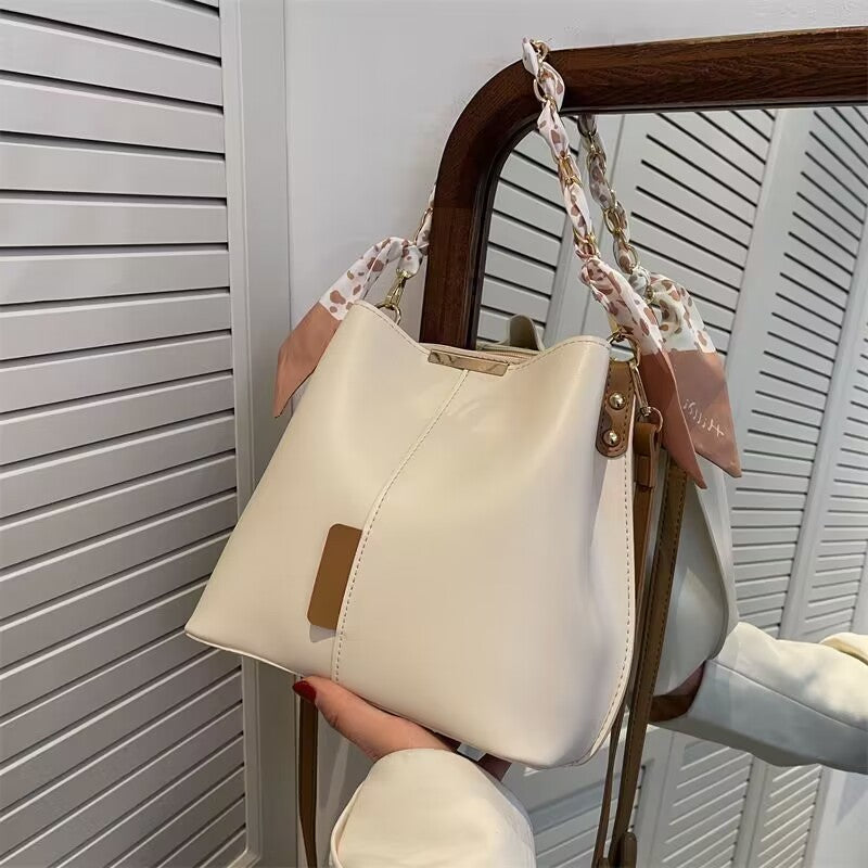 Bucket bag with fabric handle detail