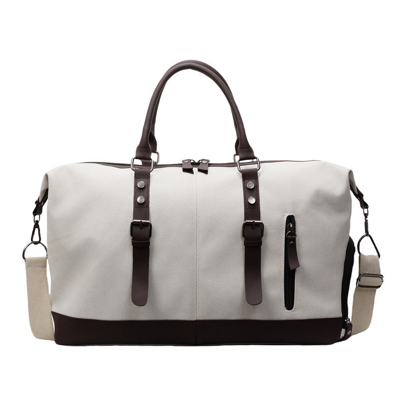 Canvas duffel bag with leather accents