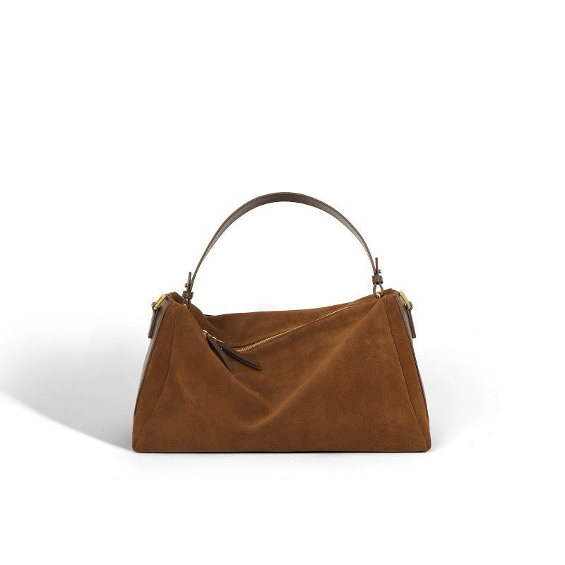 Triangular handbag with single handle