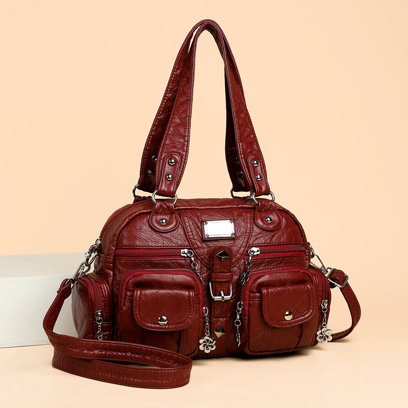 Multi-pocket handbag with detachable strap