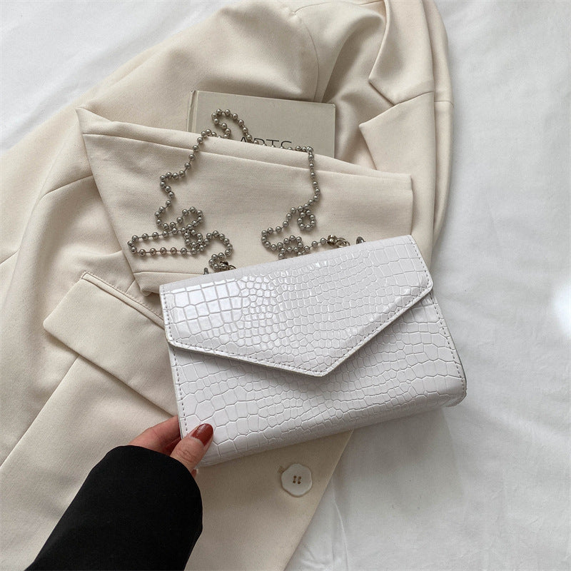 Envelope crossbody bag with chain strap