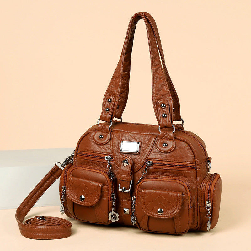 Multi-pocket handbag with detachable strap