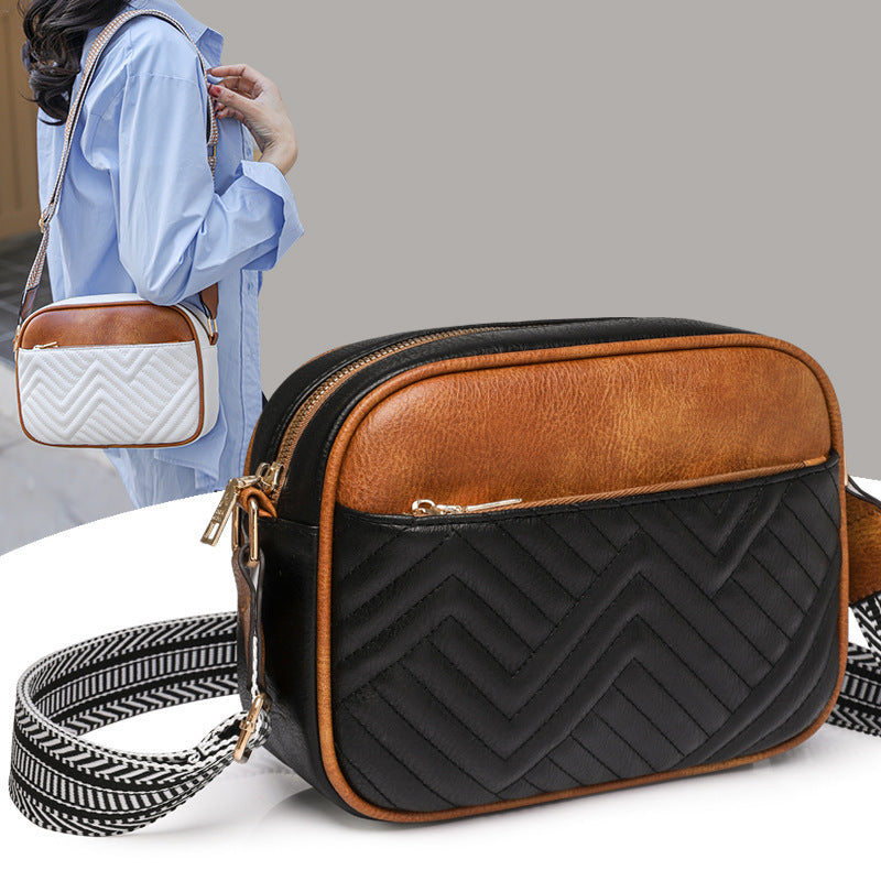 Quilted crossbody bag with front pocket
