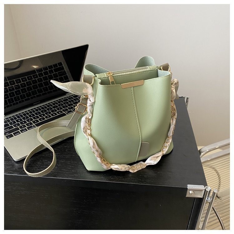 Bucket bag with fabric handle detail
