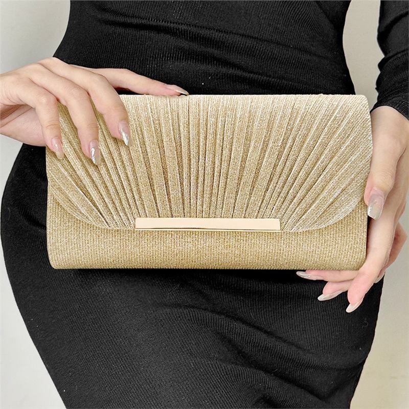 Pleated clutch bag with metallic accent