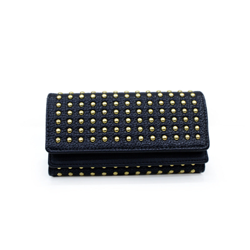 Studded wallet with flap closure