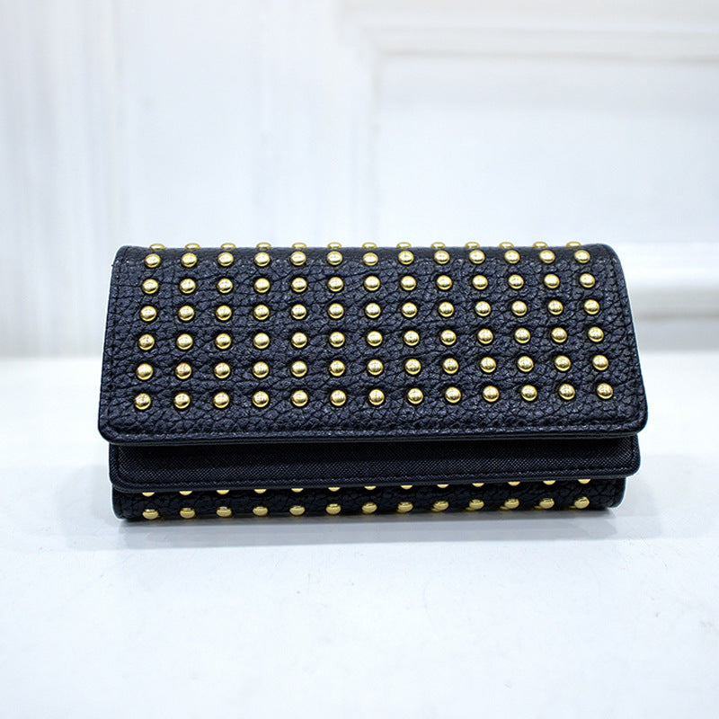 Studded wallet with flap closure