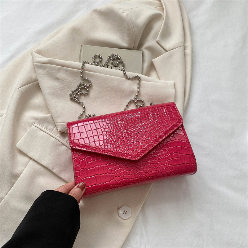 Envelope crossbody bag with chain strap