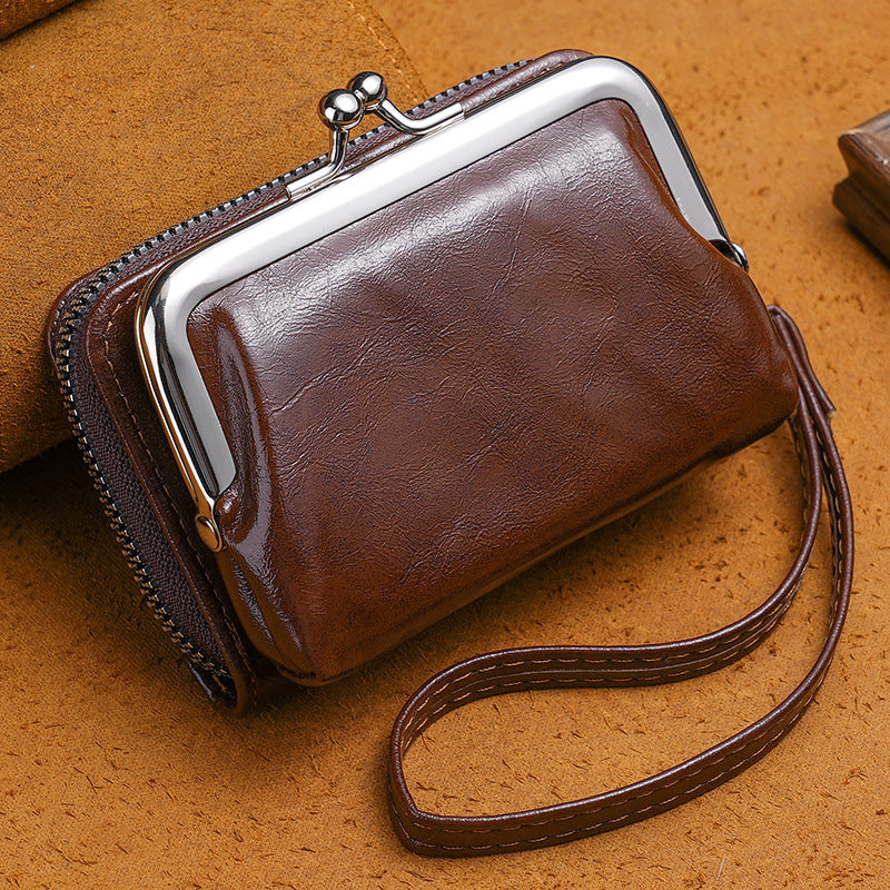 Compact wallet with dual closure design