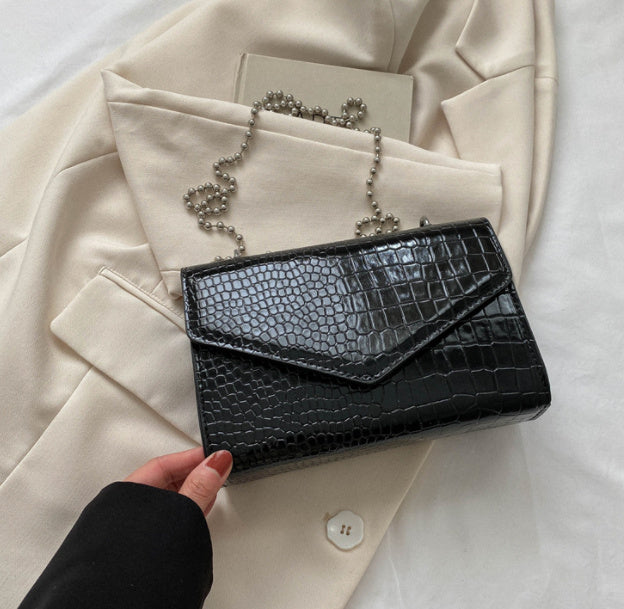 Envelope crossbody bag with chain strap