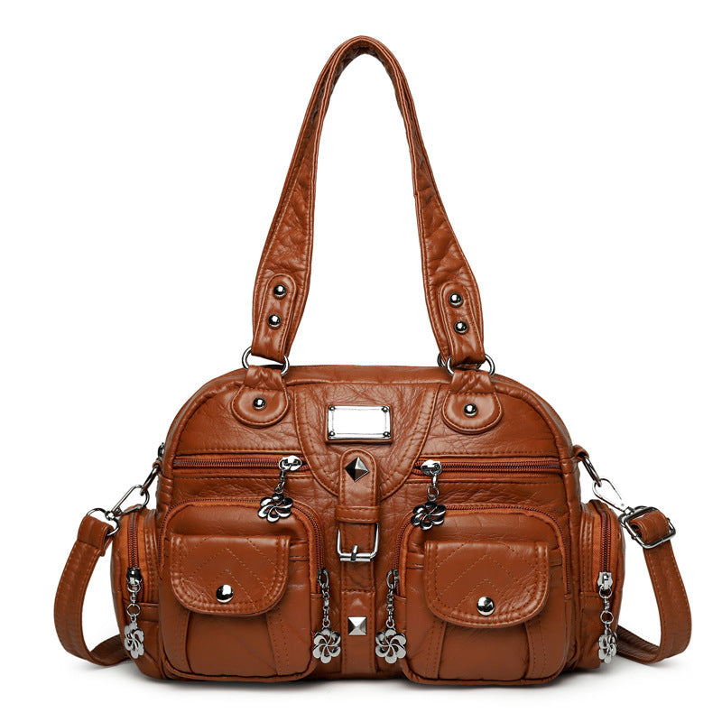 Multi-pocket handbag with detachable strap