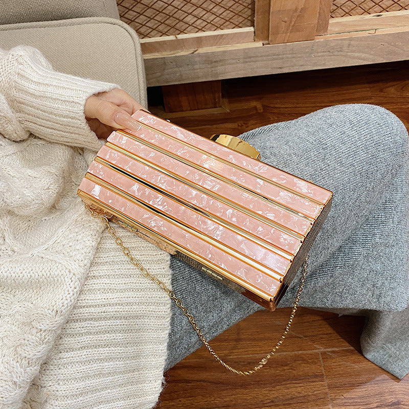 Rhinestone embellished clutch bag with chain strap