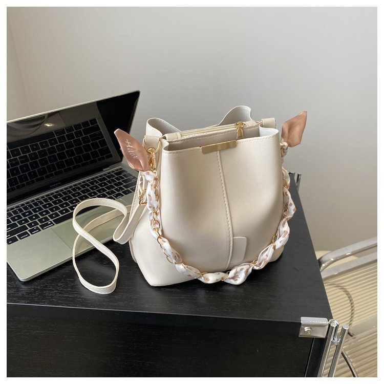 Bucket bag with fabric handle detail