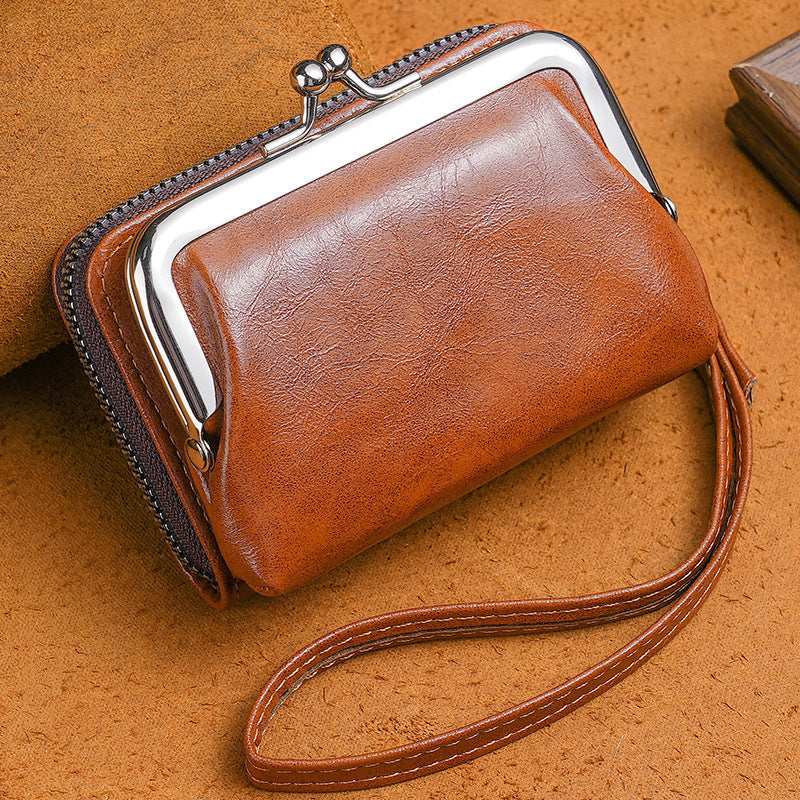 Compact wallet with dual closure design