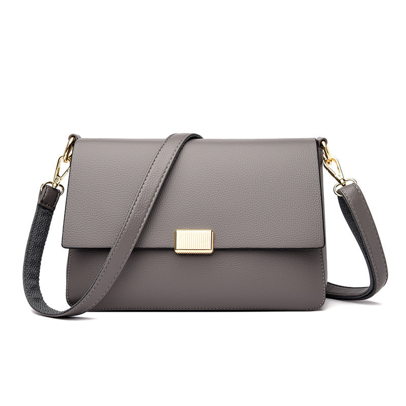Rectangular shoulder bag with flap closure