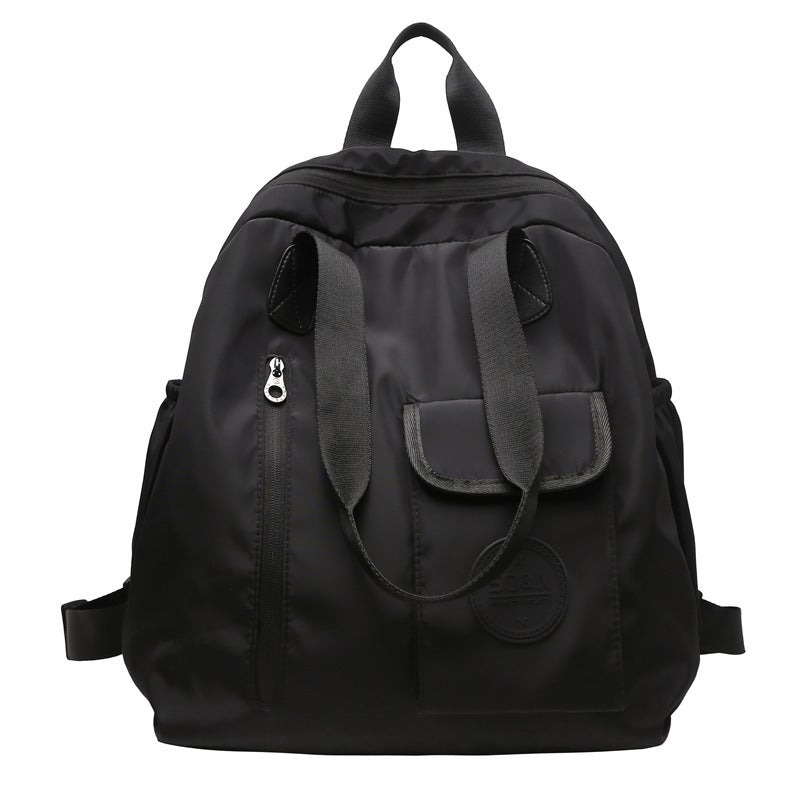 Soft backpack with flap and drawstring closure