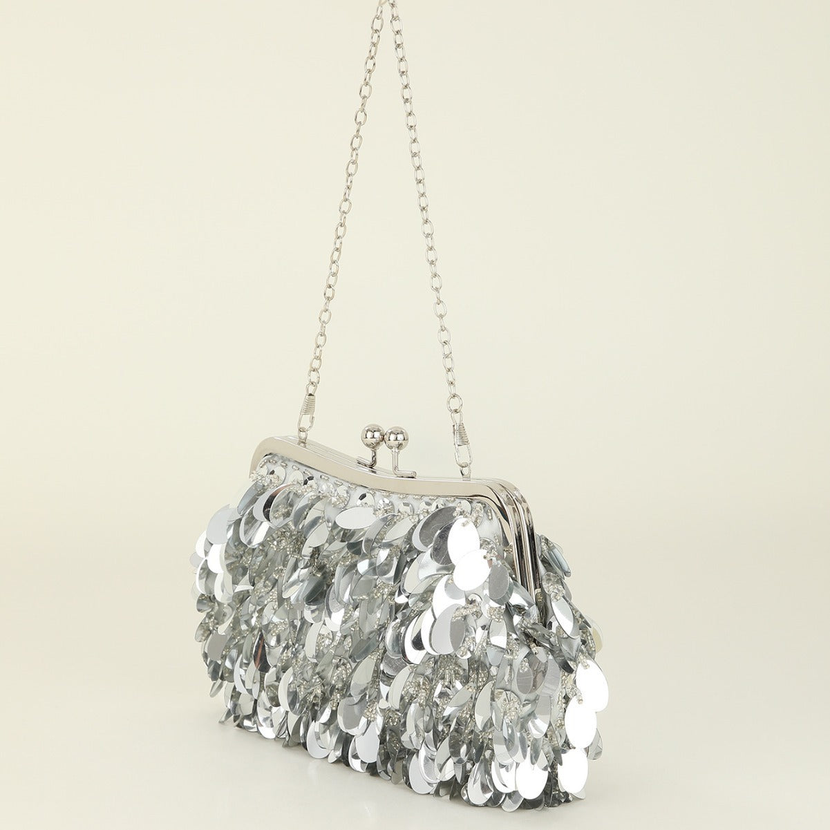 Sequined clutch bag with chain strap