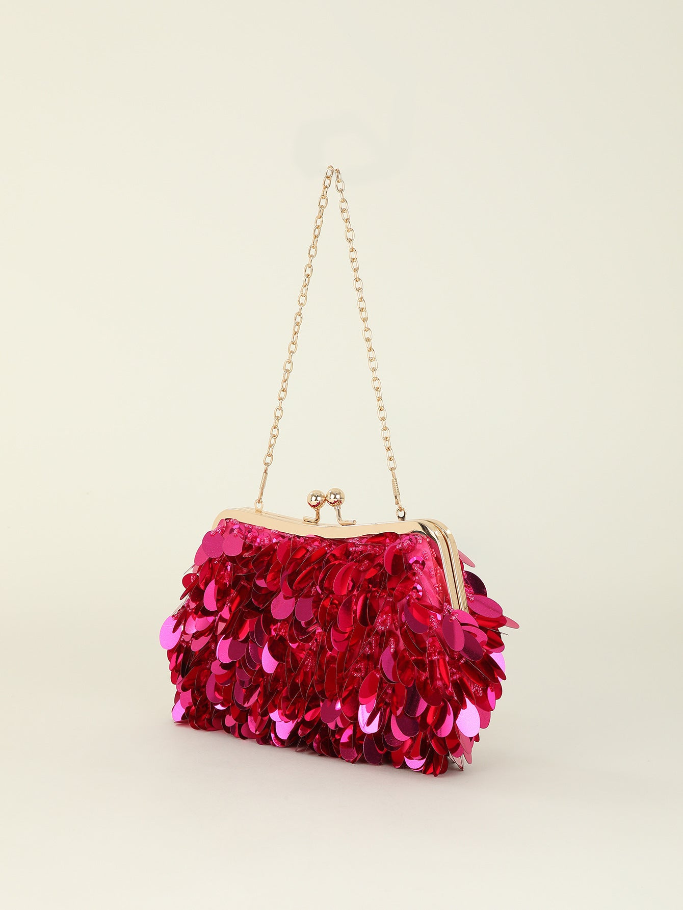 Sequined clutch bag with chain strap