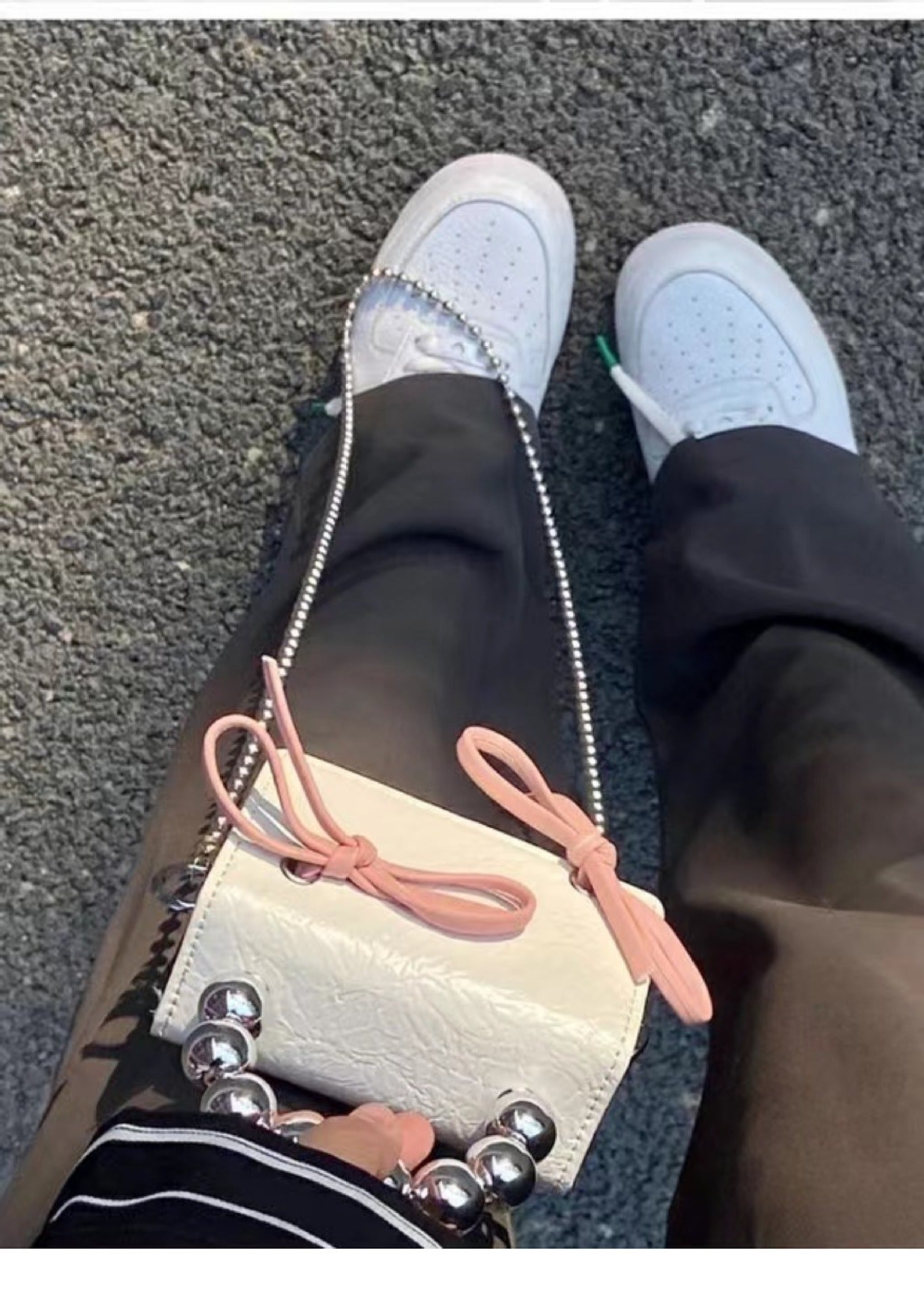 Mini handbag with bow and beaded handle