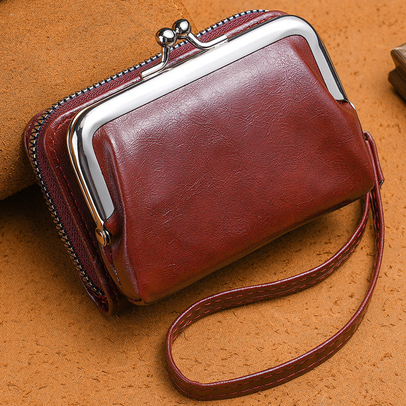 Compact wallet with dual closure design