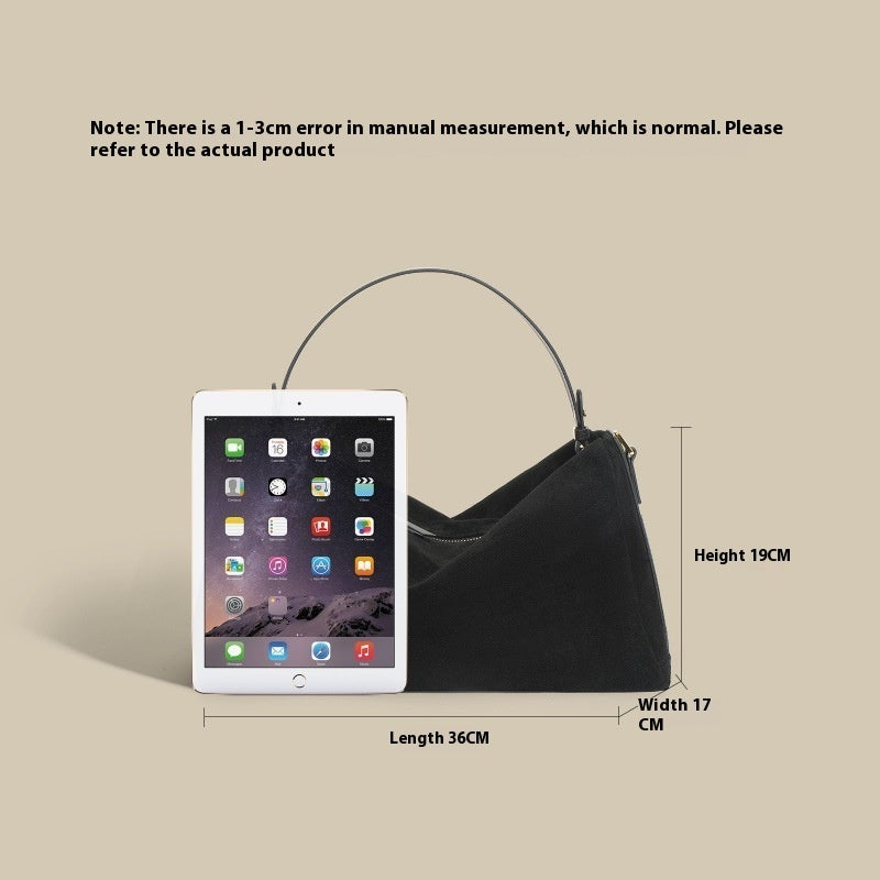 Triangular handbag with single handle