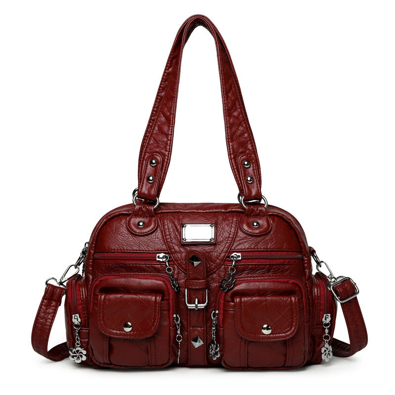 Multi-pocket handbag with detachable strap