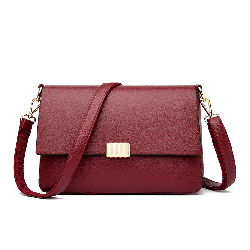Rectangular shoulder bag with flap closure