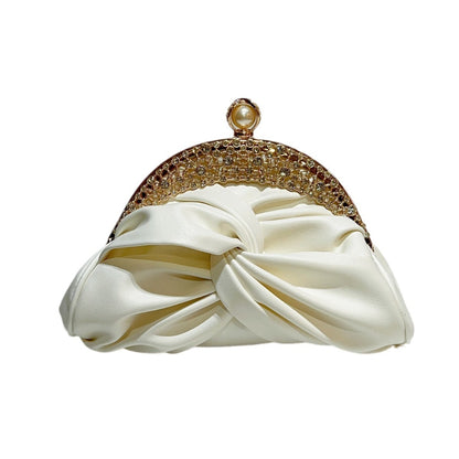 Satin clutch bag with metal frame