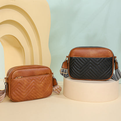 Quilted crossbody bag with front pocket