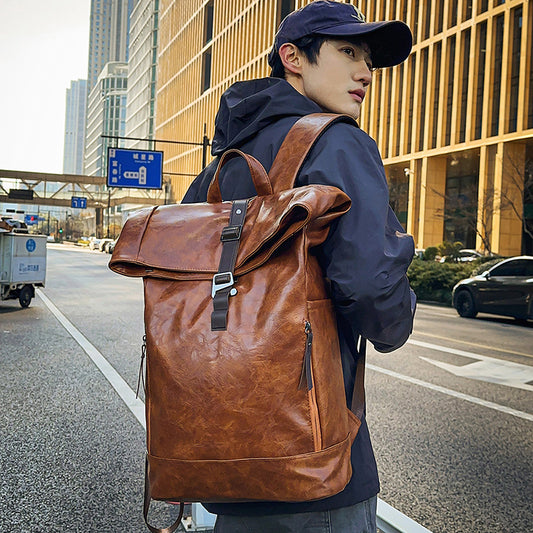 Fold-over leather-look backpack with buckle strap