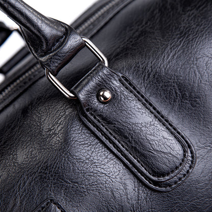 Handbag with detachable shoulder strap