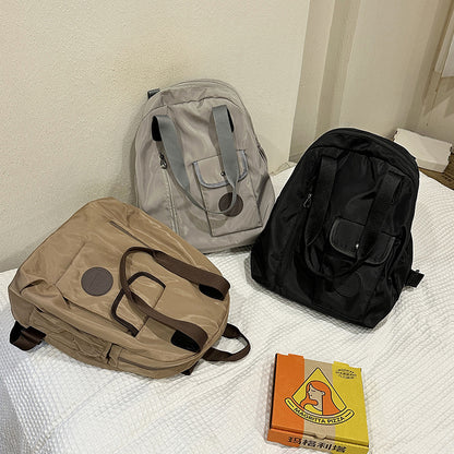 Soft backpack with flap and drawstring closure