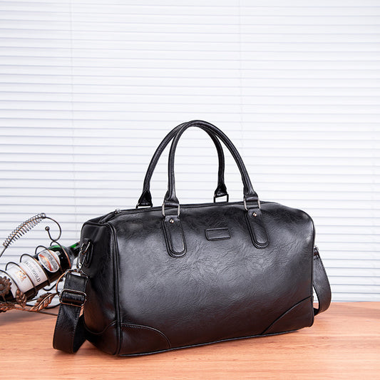 Handbag with detachable shoulder strap