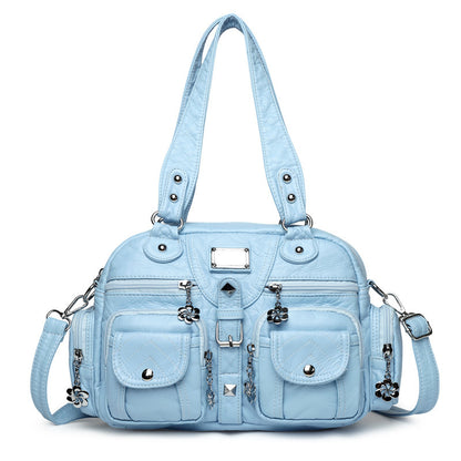 Multi-pocket handbag with detachable strap