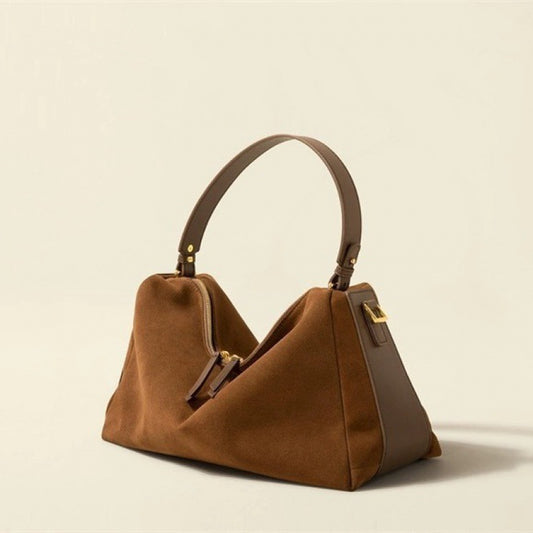 Triangular handbag with single handle