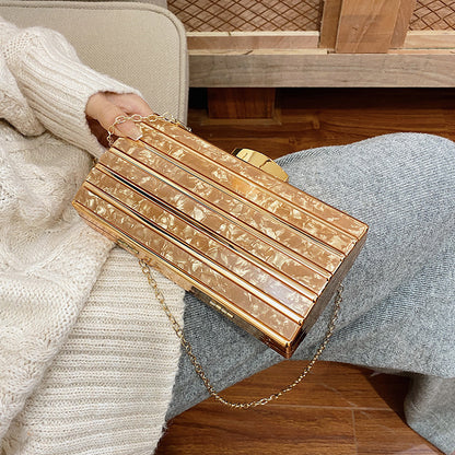 Rhinestone embellished clutch bag with chain strap