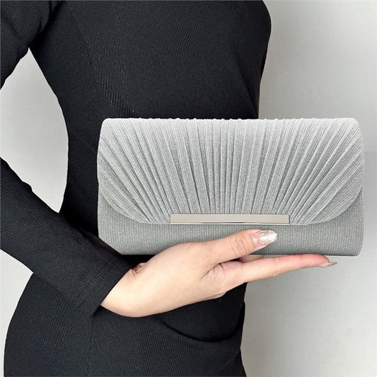 Pleated clutch bag with metallic accent