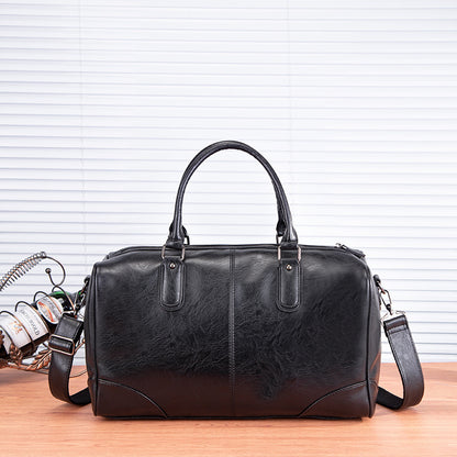 Handbag with detachable shoulder strap