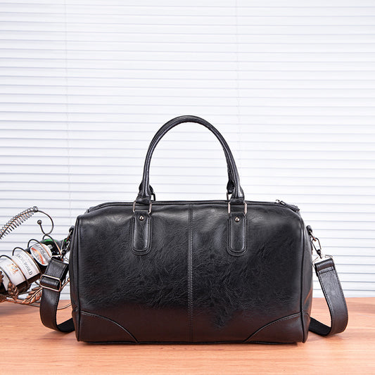 Handbag with detachable shoulder strap